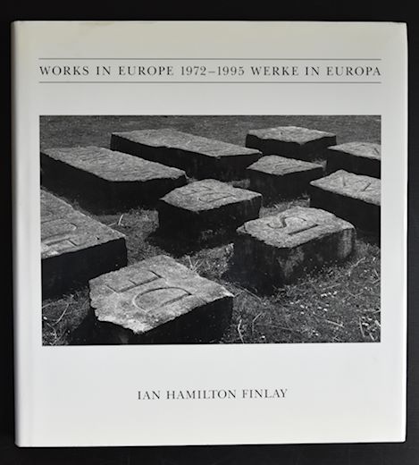 Cover of the book 'Works in Europe 1972-1995' by Ian Hamilton Finlay, featuring stone slabs with inscriptions in a grassy landscape.